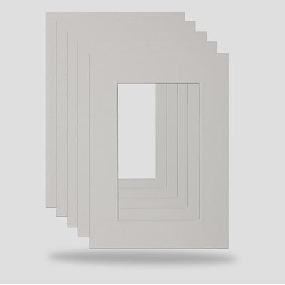 7x5 inch picture framing mounts available in soft white colour to hold a 5x3 inch print, photograph or art.  Ideal for the professional framer, artist, hobbyist or anyone wishing to enhance their picture frames.