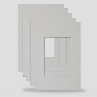  6x4 inch picture framing mounts available in soft white colour to hold a 3.x2.5 inch print, photograph or art.  Ideal for the professional framer, artist, hobbyist or anyone wishing to enhance their picture frames.